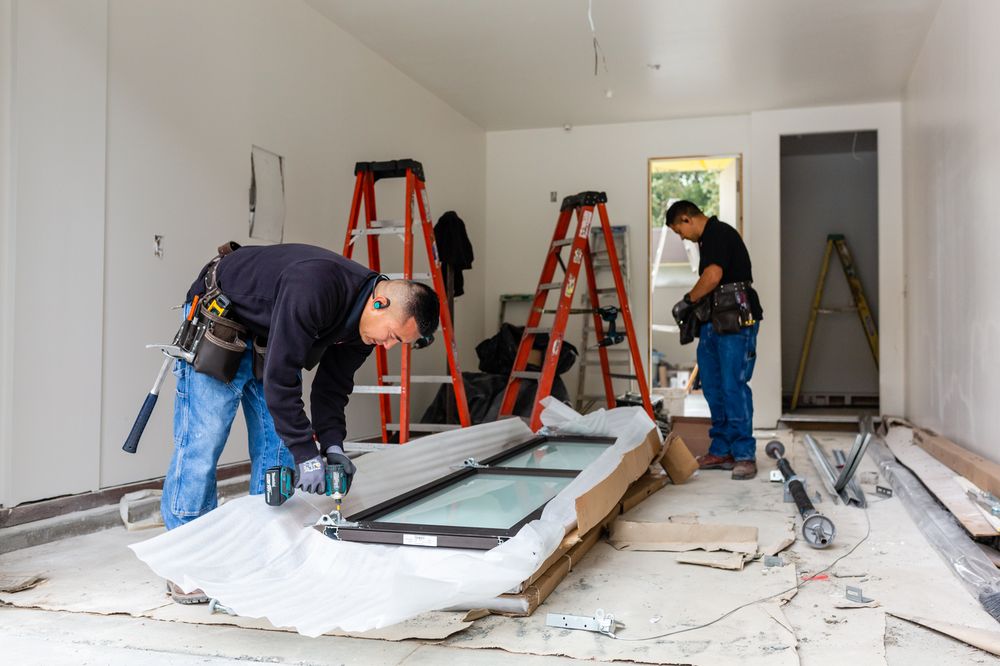 Level 10 technicians performing garage door service